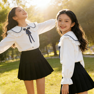 女童纯棉娃娃领长袖衬衫2026春装新款洋气大儿童公主白色上衣短裙