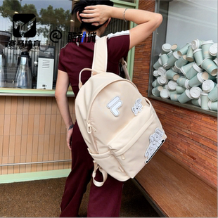 FILA斐乐  乳糖色男女通勤大容量书包双肩包电脑包T13U532105FBG