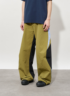 闷与狂FMACM 弧形分割拼接打褶运动尼龙长裤