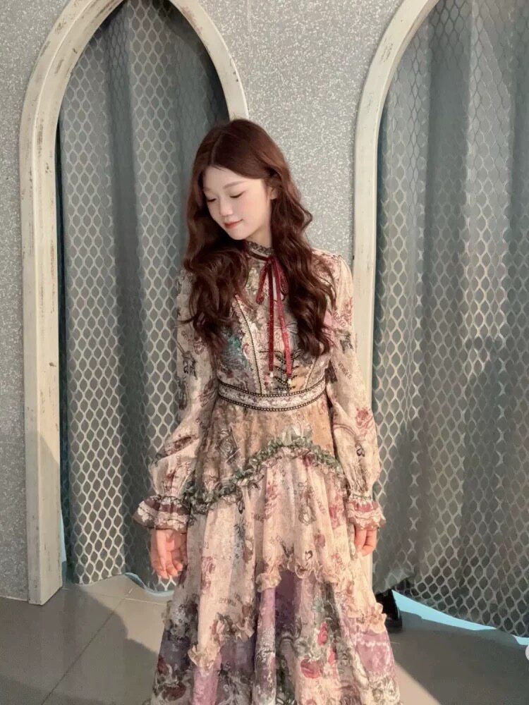 星妍露露2026早春新款时尚气质立领长袖针织连衣裙女中长款裙子