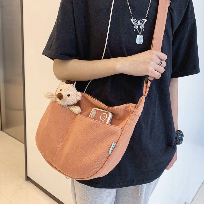 女士高级感帆布包饺子包韩版学生单肩包女大容量纯色小清新斜挎包