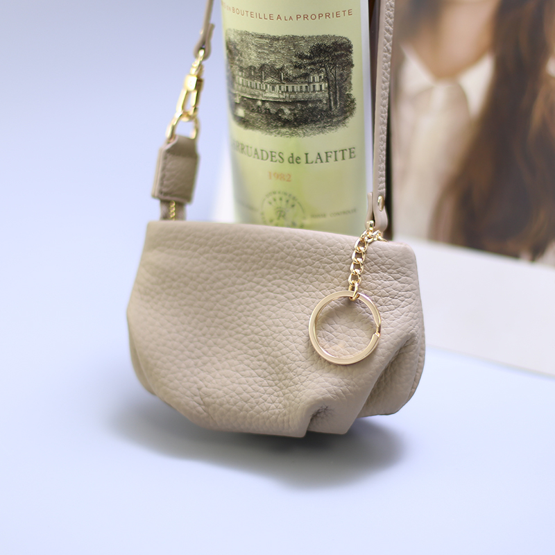 真皮手拧零钱包创意硬币包