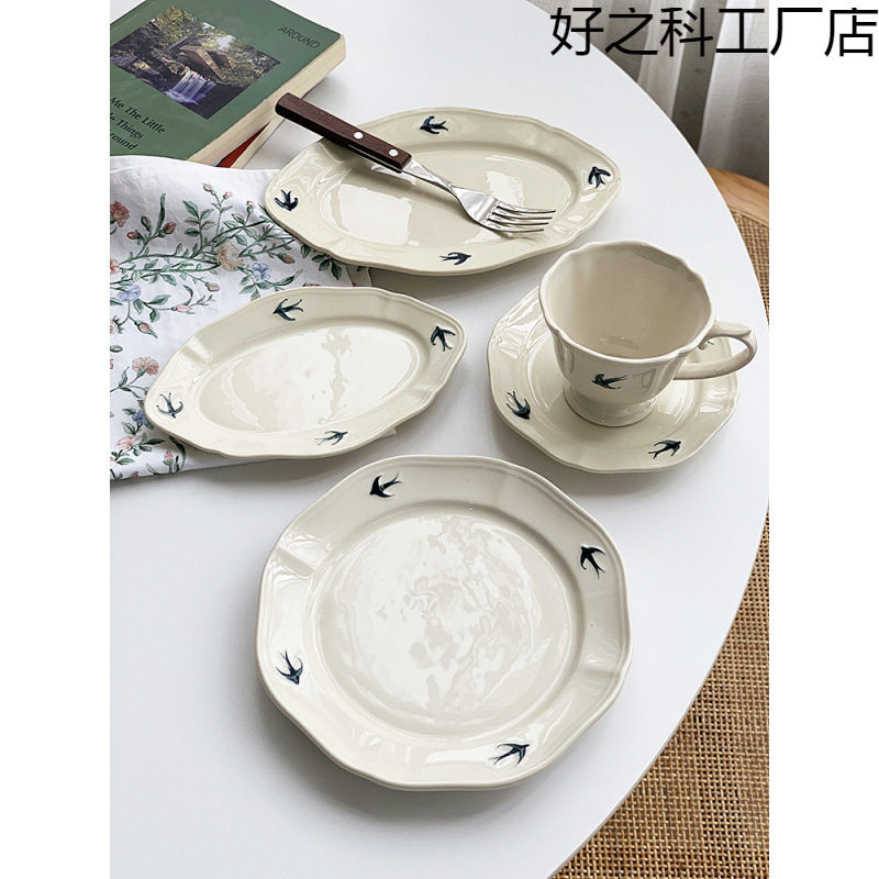 日式风高颜值餐具复古浮雕手绘燕子陶瓷盘椭圆盘甜品盘点心盘