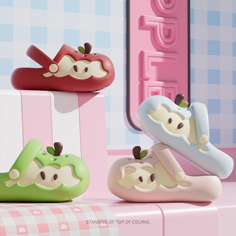 Colorful cartoon-style slipper shoes displayed on pastel blocks
