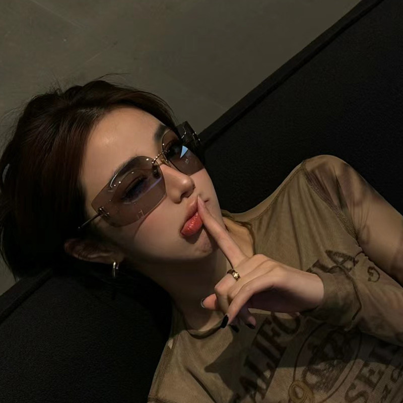 骑行运动户外无框茶色太阳眼镜欧美风大框防风防晒网红墨镜女显瘦