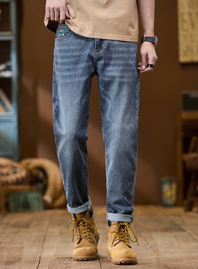 2025春季新款拼色W刺绣精品腰绣花蓝色水洗合身小脚牛仔长裤男士