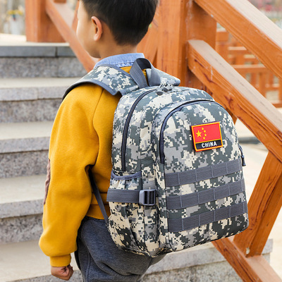 男孩书包小学生儿童迷彩双肩包轻便减负多口袋背包防水吃鸡三级包