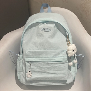 蓝色背包女2025新款双肩包旅游轻便初中生书包大容量纯色休闲包