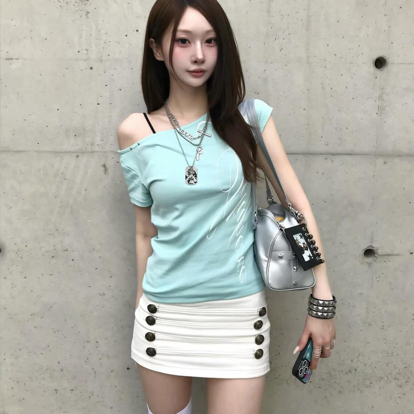 韩版小众古铜白色纽扣低腰半身裙女辣妹风百搭修身包臀A字短裙裤