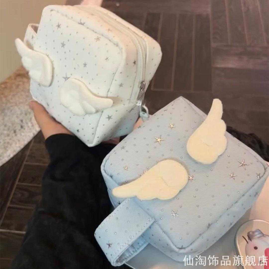 通勤百搭满天星羽翼收纳包加厚内里防磕碰美瞳发饰拍立得手提袋