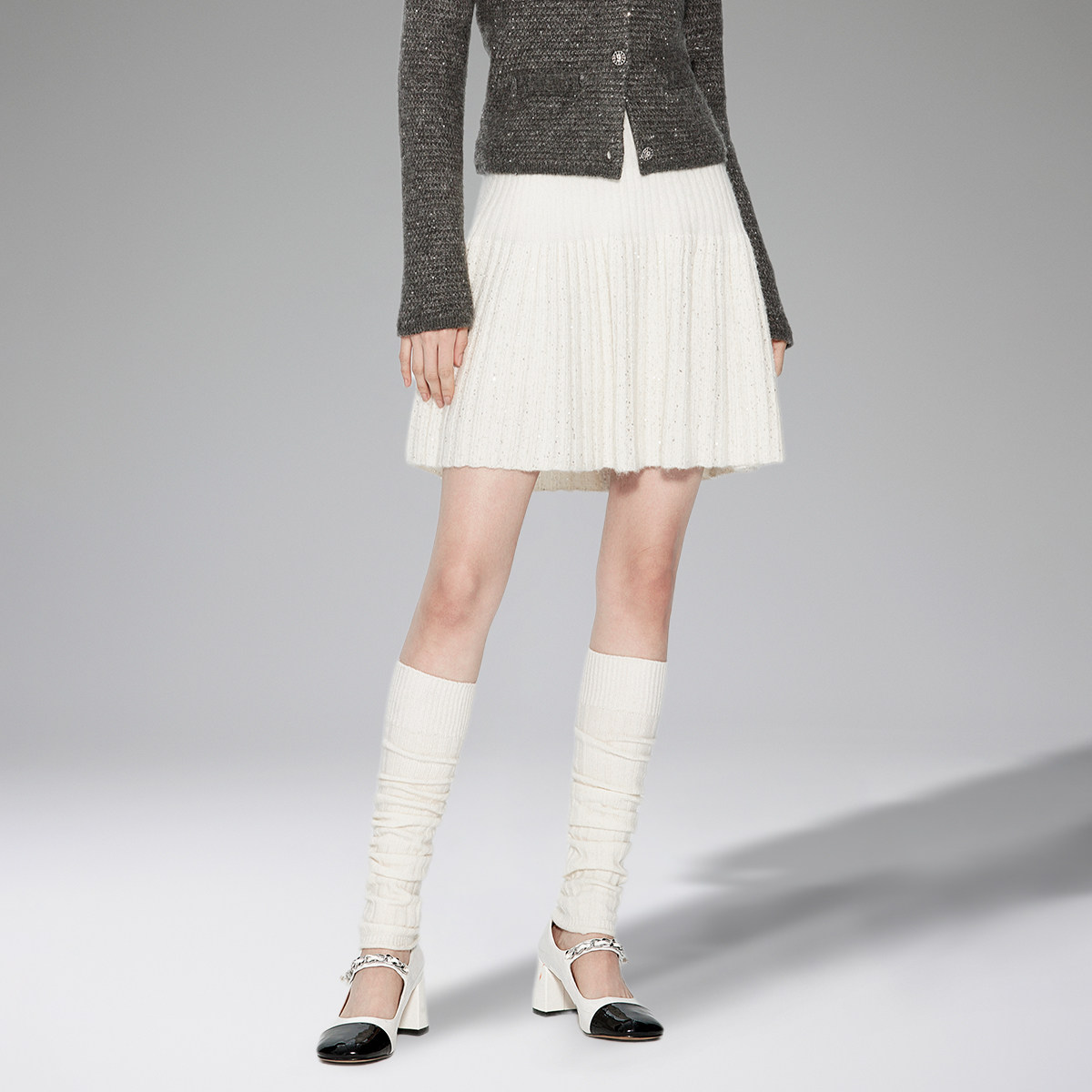 ochirly欧时力坑条珠片毛织半裙