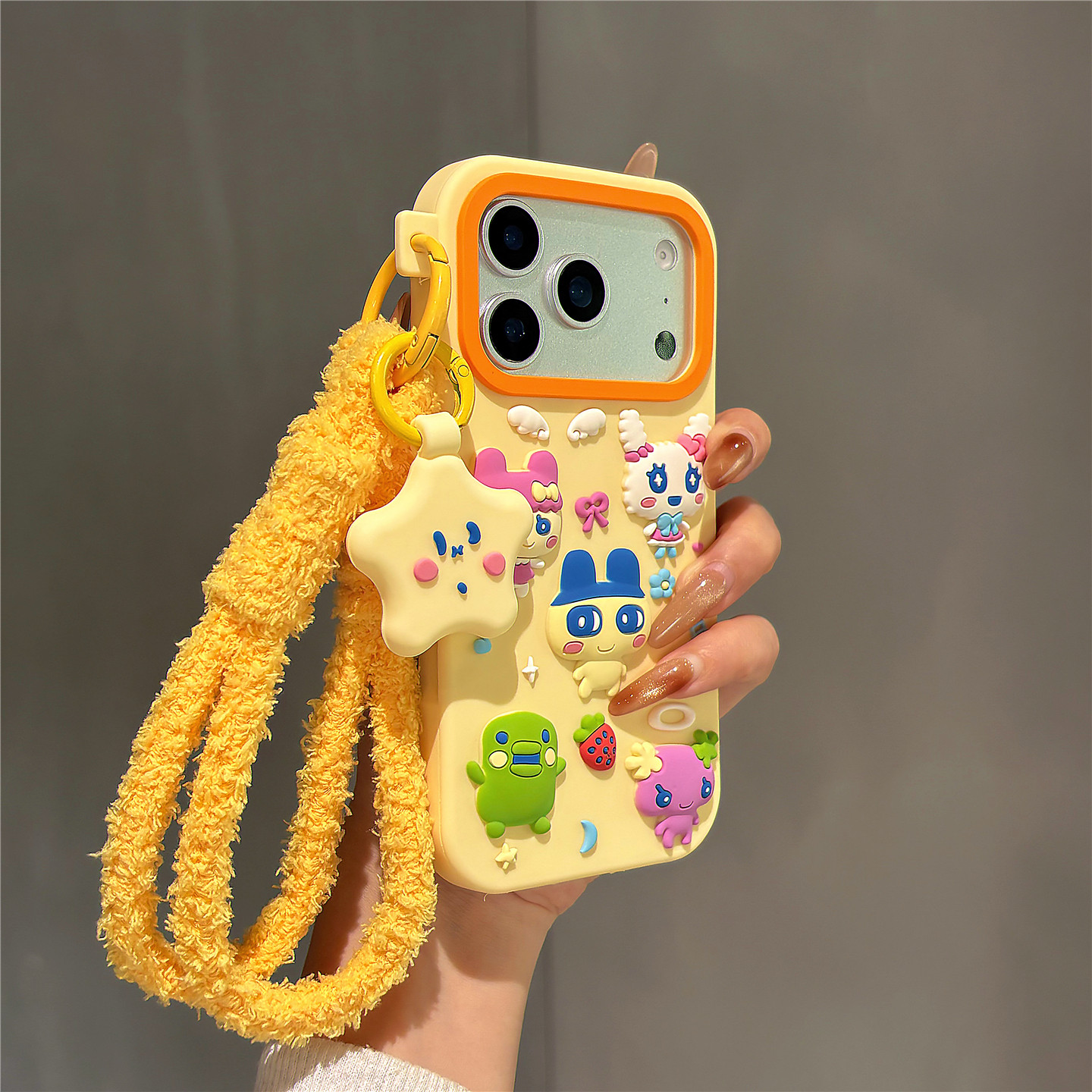 奶黄色可爱卡通拓麻歌子适用苹果17promax手机壳iphone