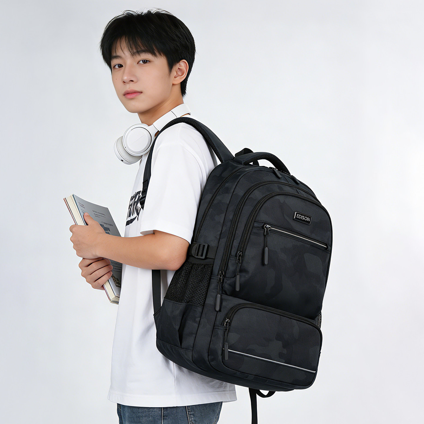 爱迪生高中生书包男反光护脊减负初中大学生双肩包大容量旅行背包