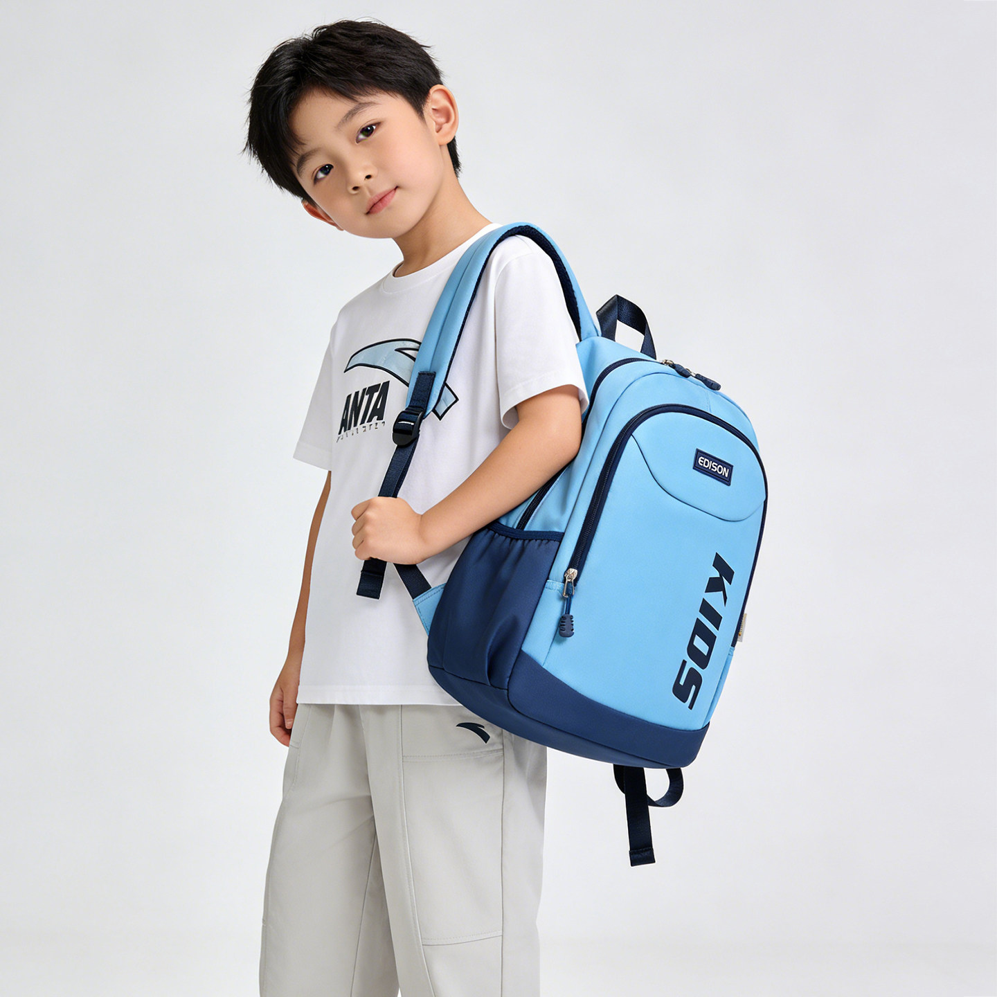 爱迪生小学生书包1-3年级儿童轻便减负户外休闲春游秋游双肩背包