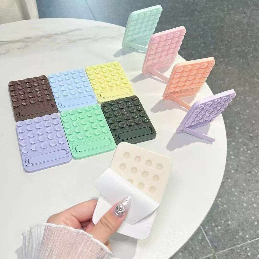 粘贴式吸盘隐形折叠防滑手机支架