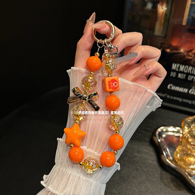 超好看星宇橙色系毛球串珠钥匙