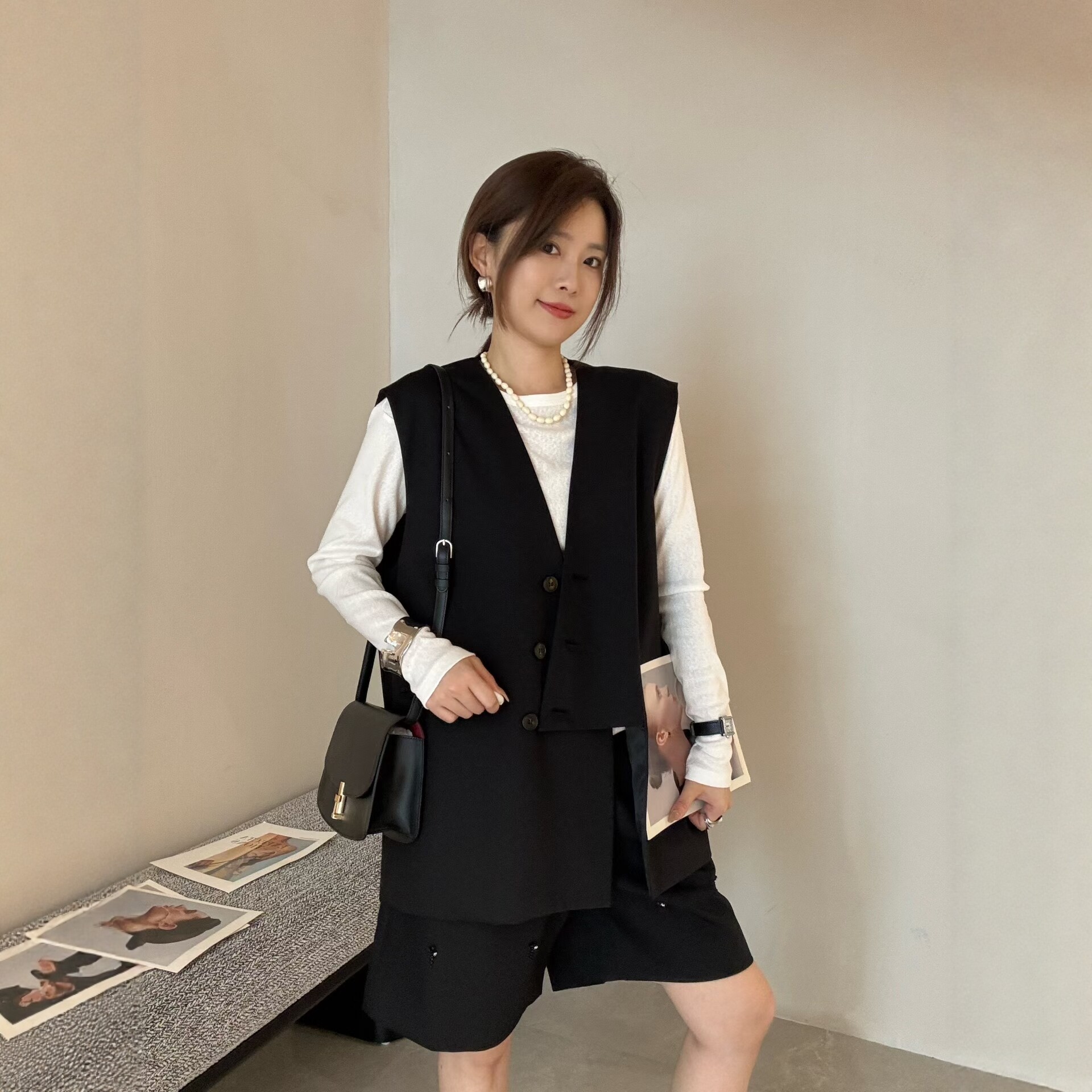LM家高品  秋冬新品巨显瘦百搭款门襟不规则设计西服面料长款马甲