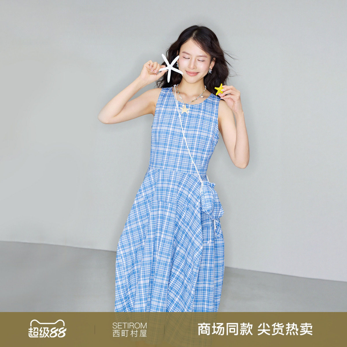 西町村屋设计感花苞连衣裙2026夏新款时尚无袖长裙含包XHBB10615