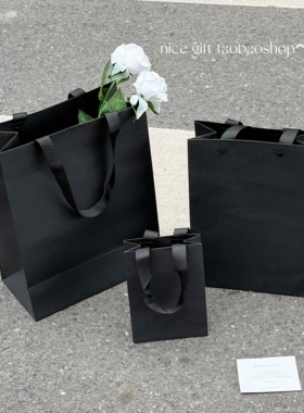 高级感黑色礼品袋加厚铆钉款牛皮纸袋服装购物收纳袋ins风伴手礼