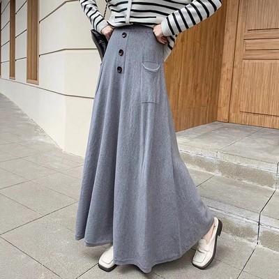 2025秋冬季女装设计感排扣高腰针织半身裙女气质大摆A字毛线长裙
