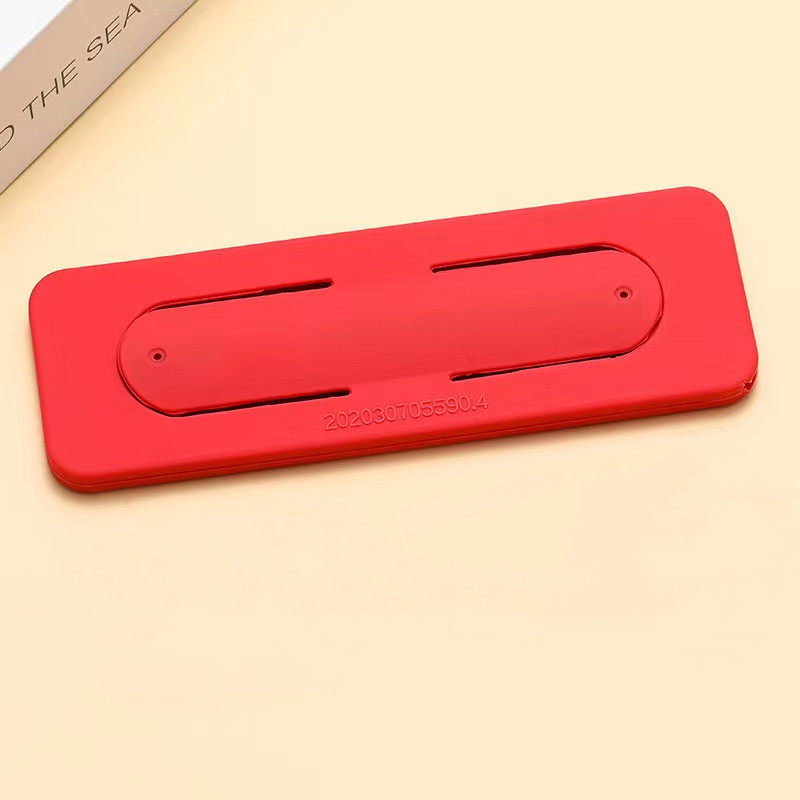 粘在手机上面的便携式眼镜盒