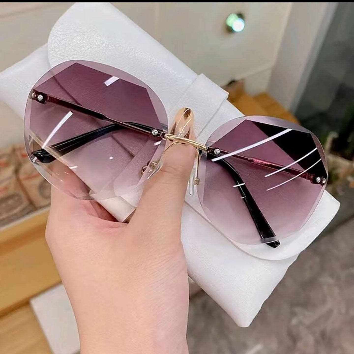 钏翔太阳镜2026新款高级感女士开车专用防紫外线防刺眼无边框眼a9