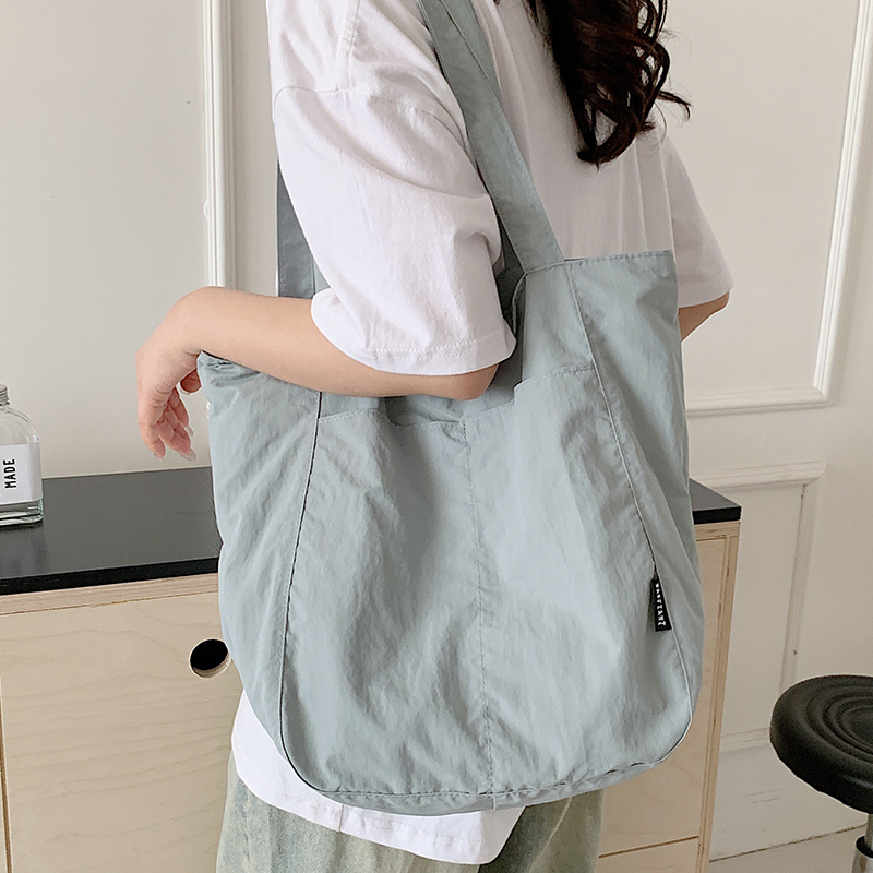 尼龙布包包女2025新款大容量潮休闲轻便单肩包百搭学生通勤托特包
