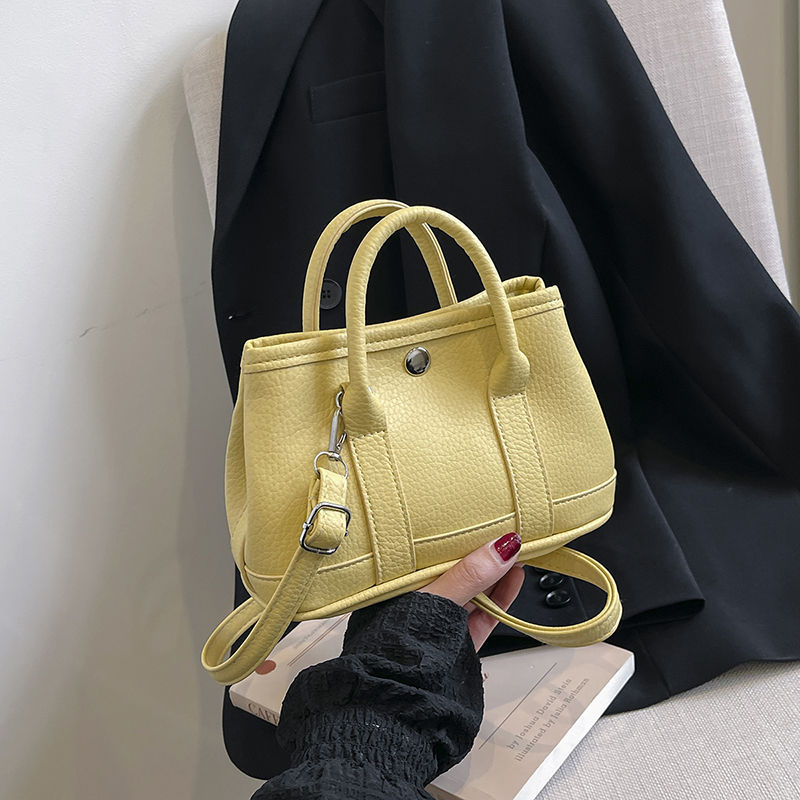 2026夏季手提花园包包女式2025新款时尚百搭水桶包高级通勤斜挎包