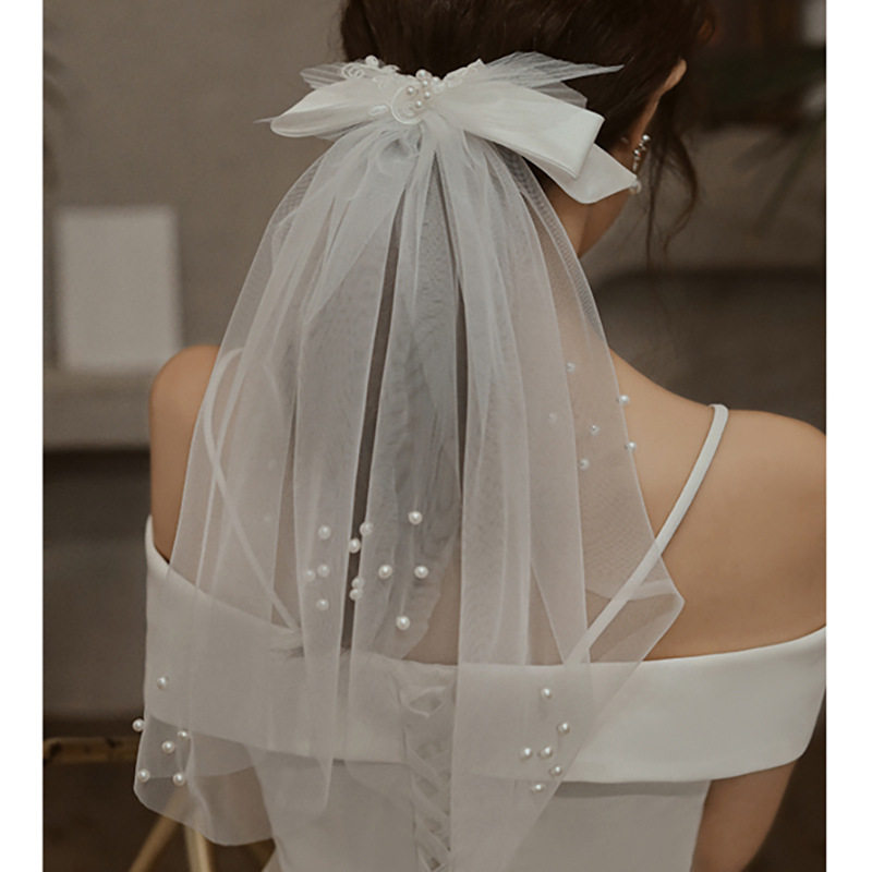 钉珠新品婚纱旅拍唯美蝴蝶结短头纱新娘礼服配饰跟妆造型婚庆定制