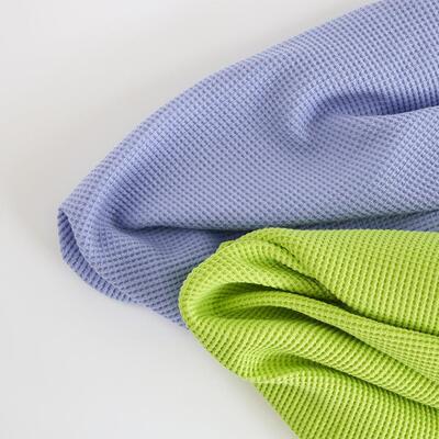 32s全棉华夫格罗纹针织布现货供应菠萝格时尚休闲男装华夫格布料