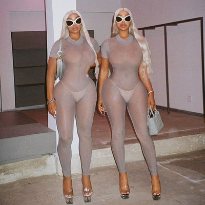 时尚透视露背短连体衣