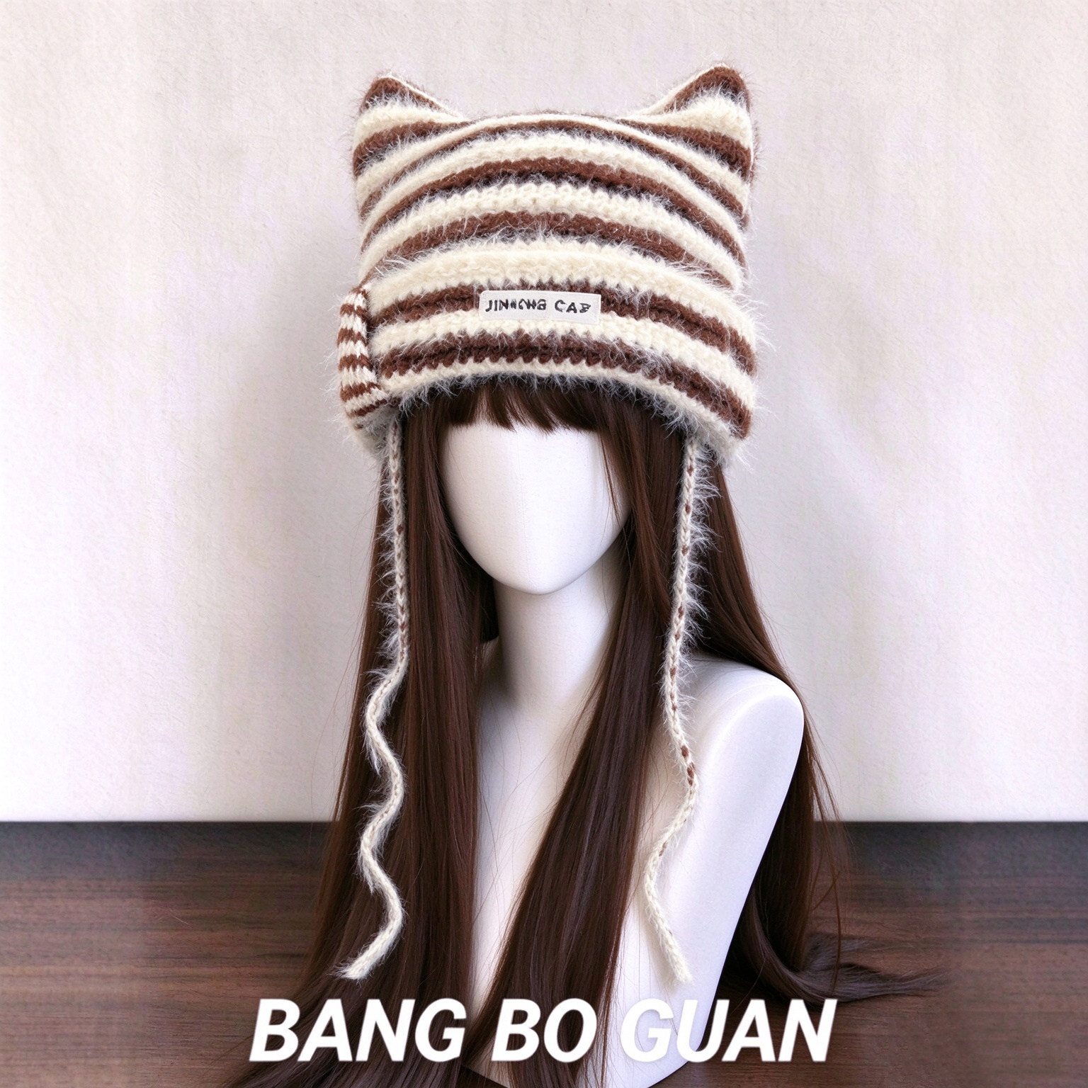 咖色条纹流苏猫耳毛绒针织帽女