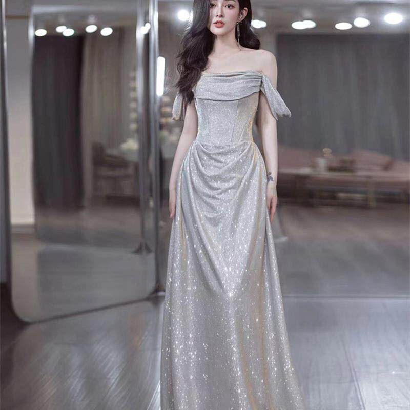 一字肩晚礼服2024新款银色气质高级感亮片宴会主持人礼服裙女艺考