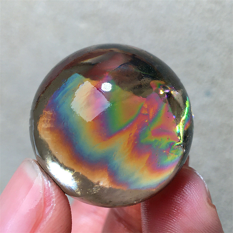 天然茶水晶球七色彩虹原石打磨千层圆球单珠原矿家居装饰品小摆件