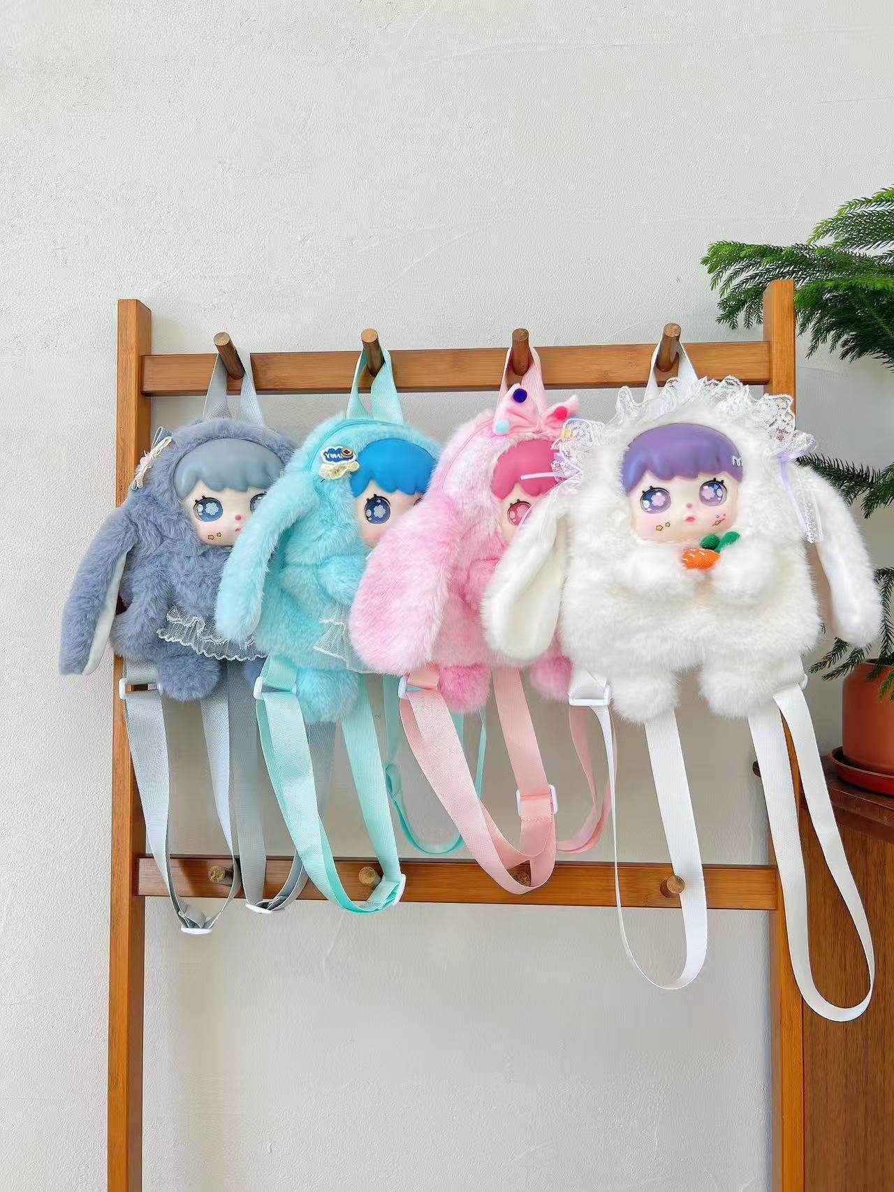 潮玩小兔毛绒公仔背包搪胶脸天使毛绒大容量双肩包女孩娃包礼物