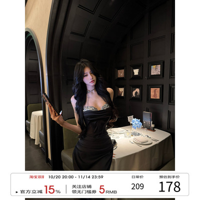 牛了牛了 一字肩抹胸连衣裙女2025秋冬包臀裙黑色长裙法式裙子