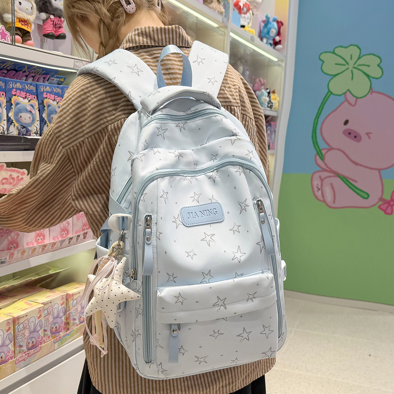 高颜值书包女初中生高中生星星印花双肩包韩版小学生轻便减负背包