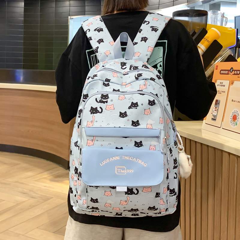 书包女小学生3一6年级韩版可爱小猫涂鸦初中女生减负儿童背包挂件