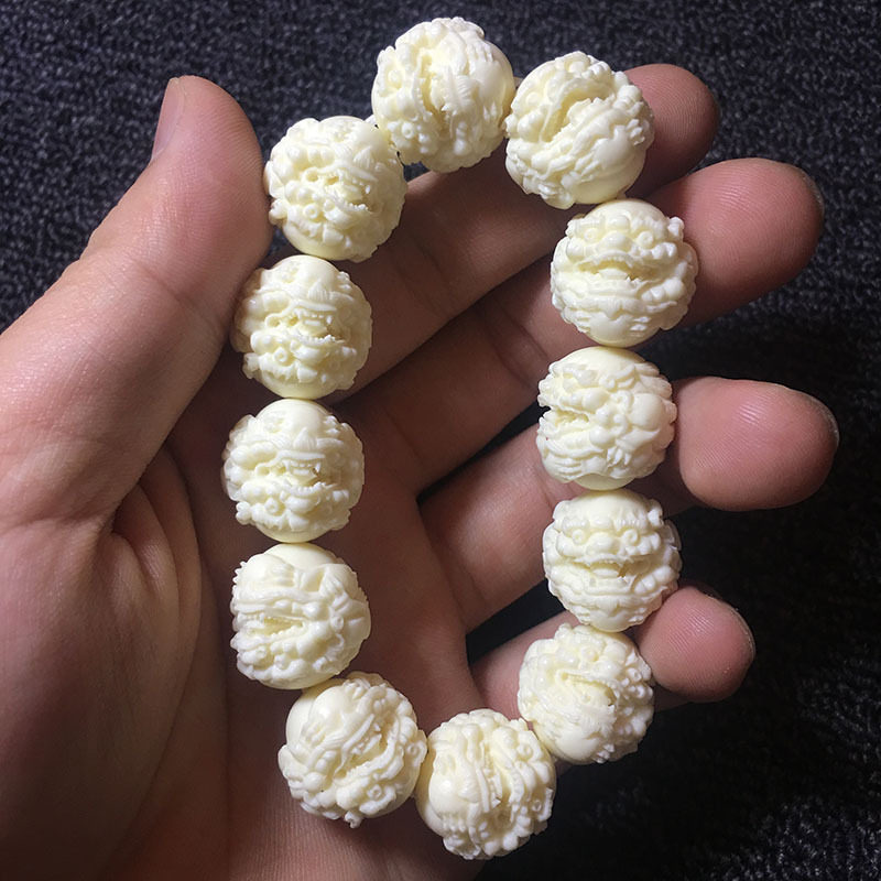 象牙果雕刻金钱守护貔貅2.0*12颗圆珠手串菩提籽椰子木念珠饰品