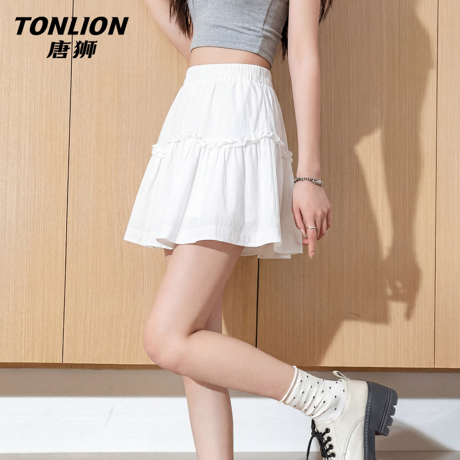 唐狮官方白色甜美半身裙女夏2026新款气质减龄高腰显瘦蛋糕短裙V