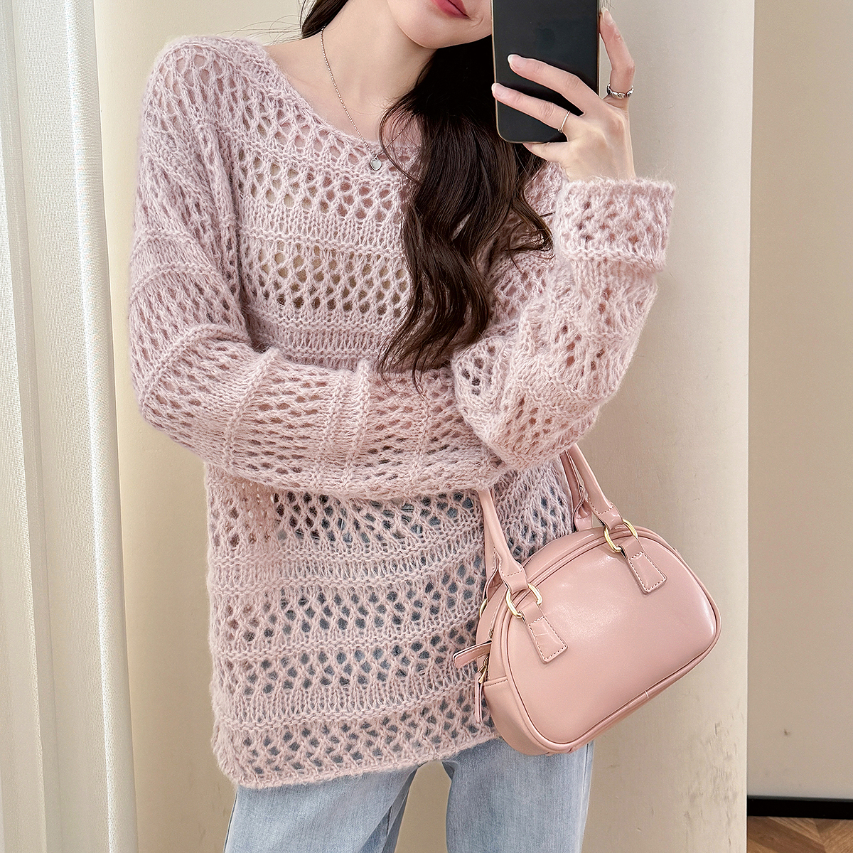 唐狮秋冬季女毛衣慵懒风镂空设计