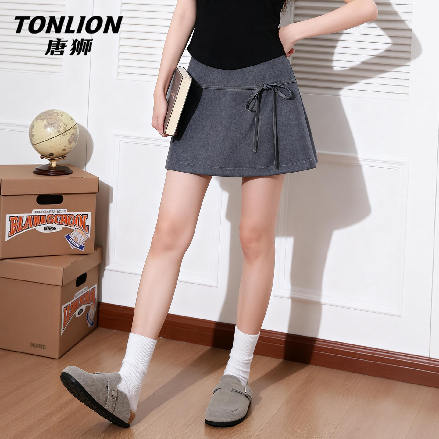 唐狮官方a字半身裙女2026新款夏运动风短裙包臀裙子显瘦西装裙V