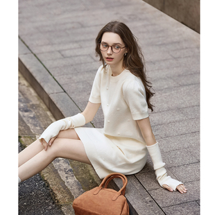 唐狮秋冬新款连衣裙女圆领镂空长袖设计气质慵懒针织毛衣裙X2TMTA