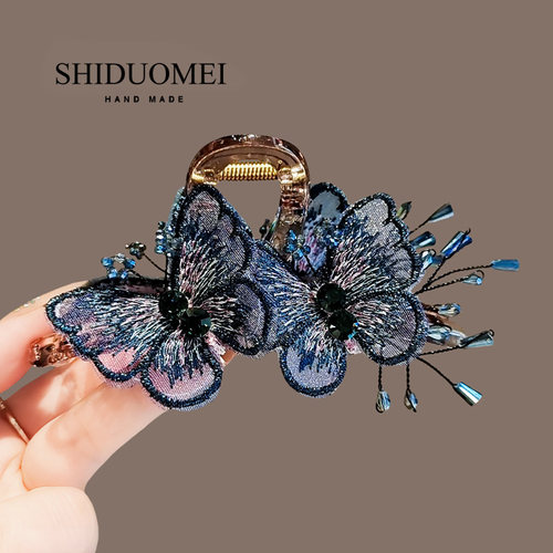 午夜蓝高级感梦幻水晶蝴蝶抓夹女