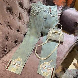 文艺复古重工钉珠国风刺绣裤脚牛仔裤女2025秋季款轻奢百搭九分裤