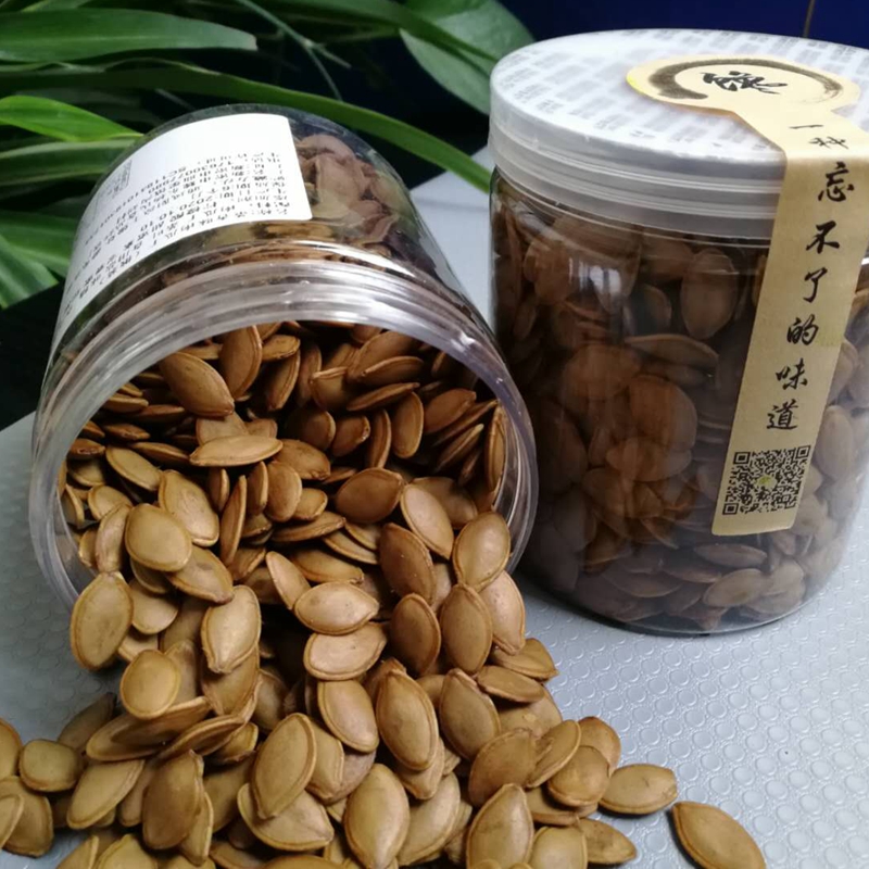 子哼卤利湿南瓜炒货大片颗粒汁湿南瓜子籽得五香卤味干罐装水煮