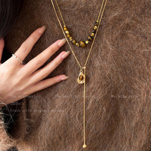 秋冬虎眼石吊坠项链女复古美拉德长款可抽拉毛衣链高级感小众配饰
