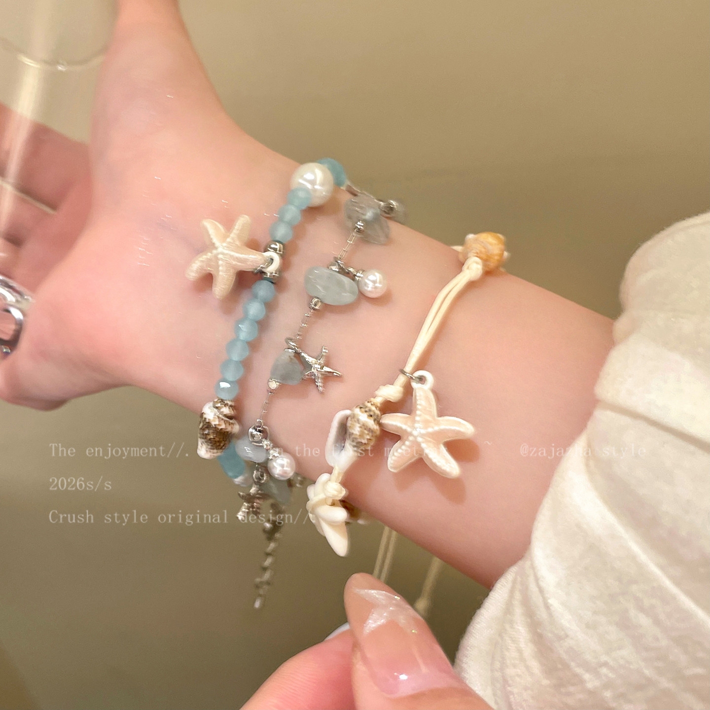 蓝色海星珍珠叠戴手链女图片