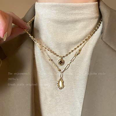 双层叠戴虎眼石贝母项链