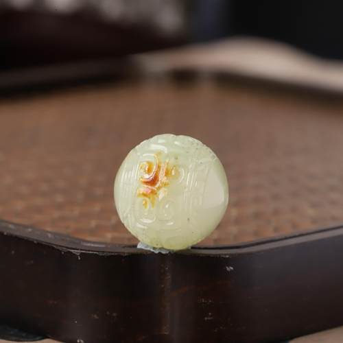 新疆和田玉籽料黄沁兽面勒子